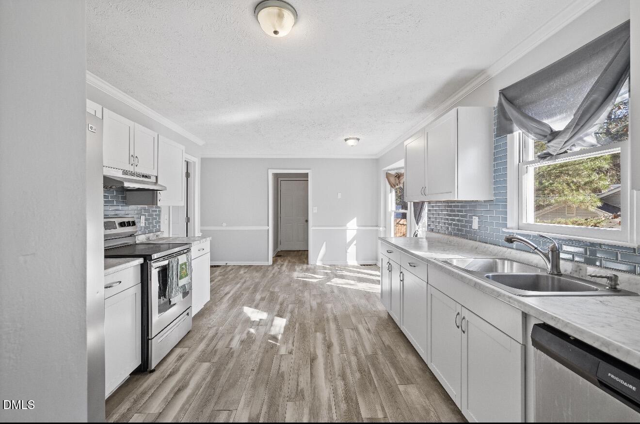 999 Flintwood Road Fayetteville, NC 28314 - Photo 6 of 23 a large kitchen with a lot of counter space