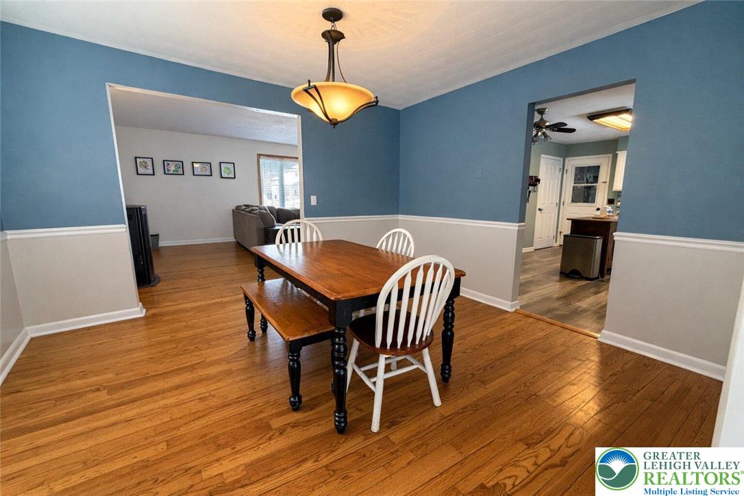 1060 Arbor Lane Slatington, PA 18080 - Photo 17 of 46 a view of a dining room with furniture and wooden floor