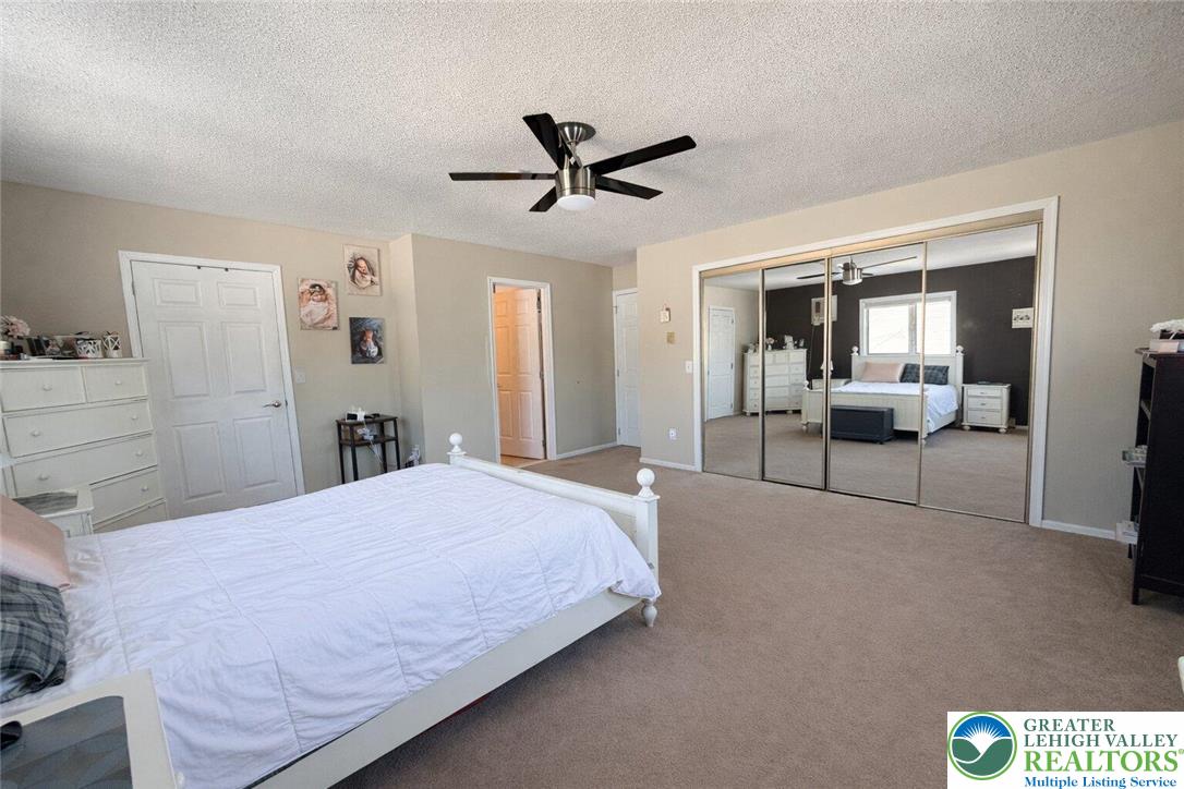 1060 Arbor Lane Slatington, PA 18080 - Photo 22 of 46 a bedroom with a bed and window