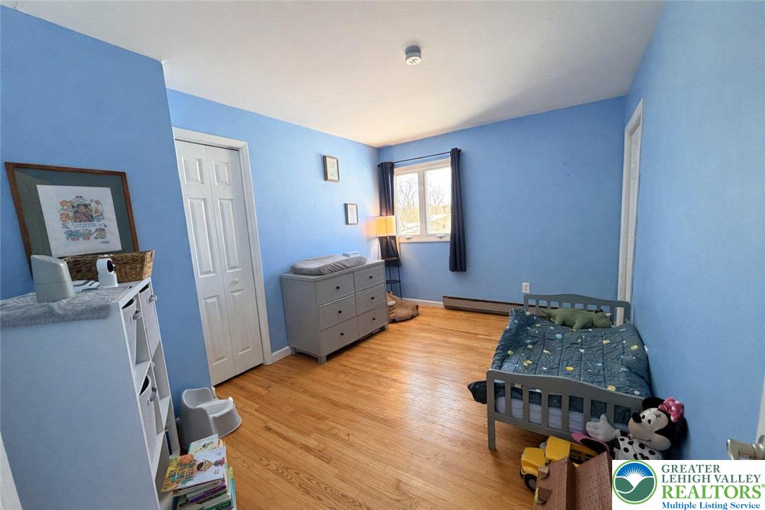 1060 Arbor Lane Slatington, PA 18080 - Photo 31 of 46 a bed room with a bed and a window