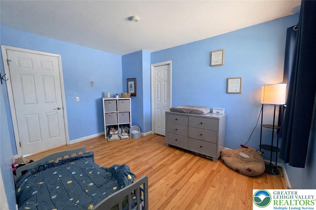 1060 Arbor Lane Slatington, PA 18080 - Photo 32 of 46 a bedroom with a bed and a dresser