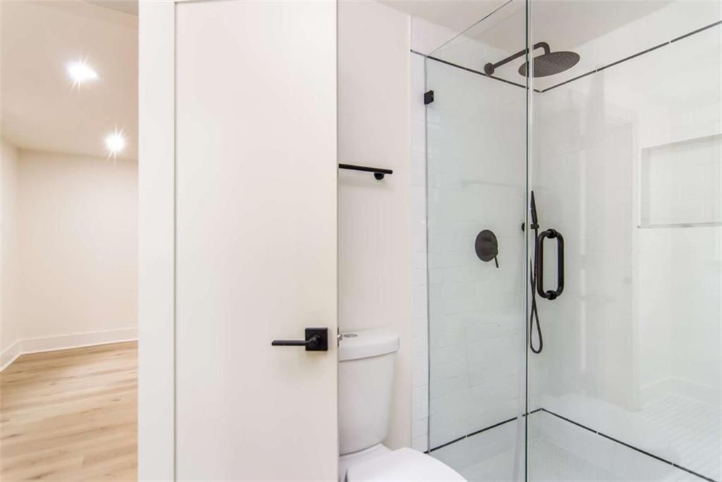 4956 Mountclaire Road Stone Mountain, GA 30087 - Photo 50 of 61 a bathroom with a shower