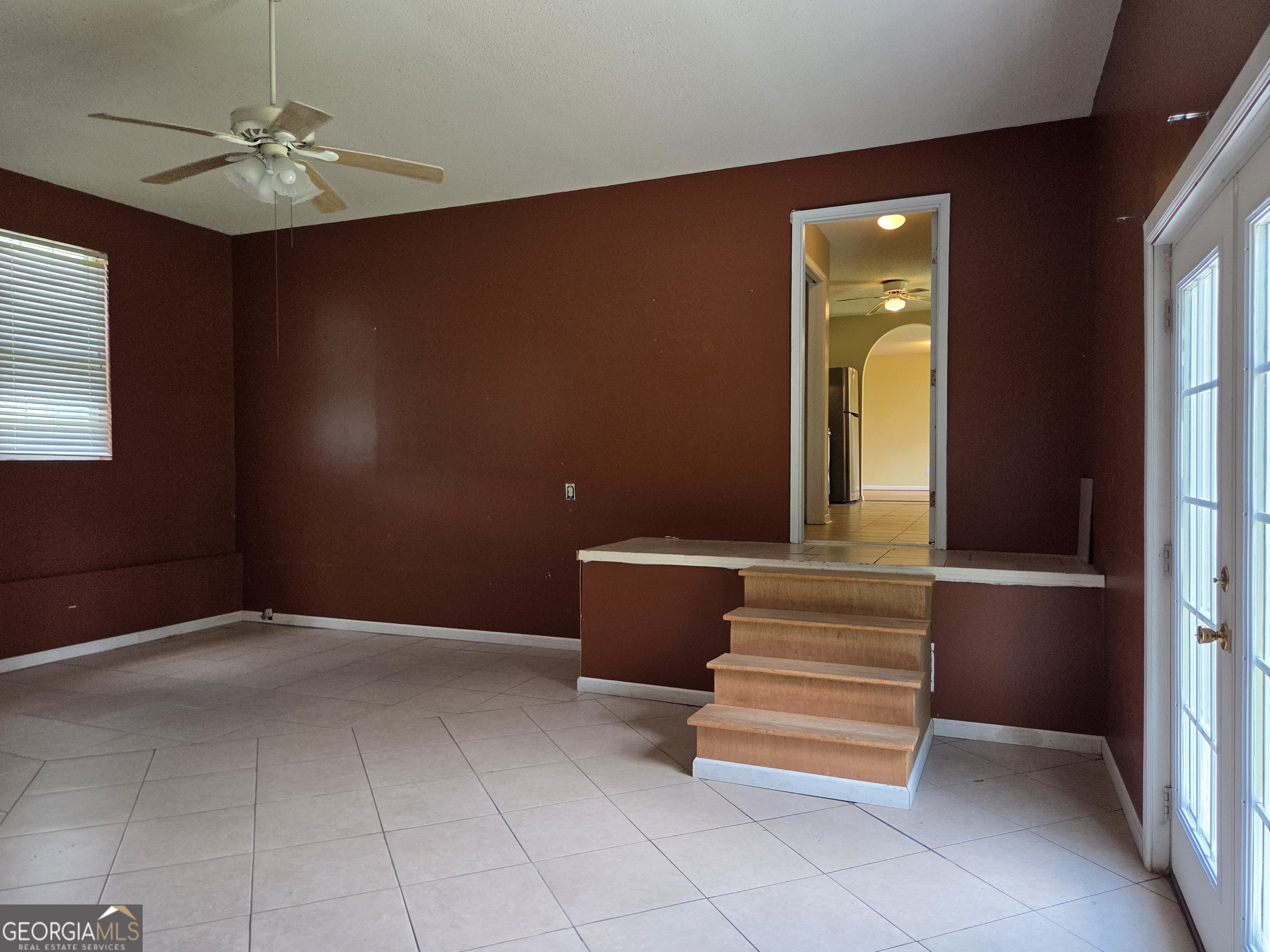 9546 Union Road Metter, GA 30439 - Photo 22 of 45 wooden floor in an empty room with a window