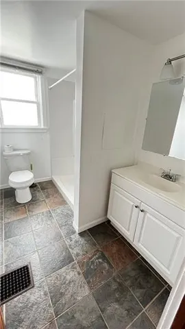a bathroom with a sink and a toilet
