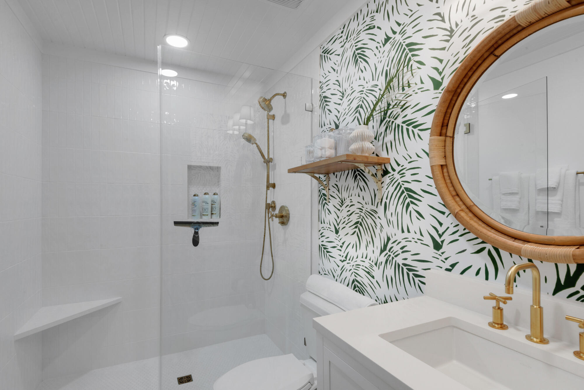 4984 West County Highway 30A, Unit 5B Santa Rosa Beach, FL 32459 - Photo 14 of 46 a bathroom with a toilet sink and mirror