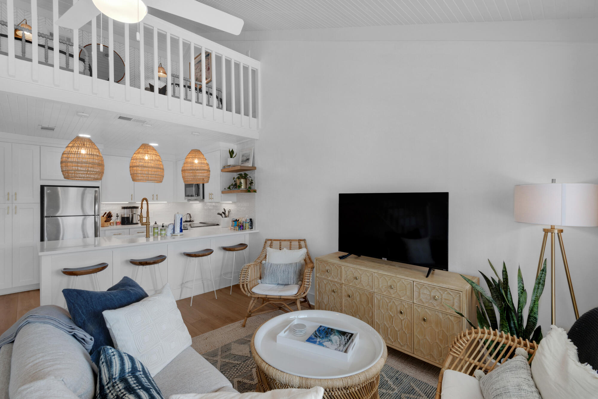4984 West County Highway 30A, Unit 5B Santa Rosa Beach, FL 32459 - Photo 19 of 46 a living room with furniture and a flat screen tv