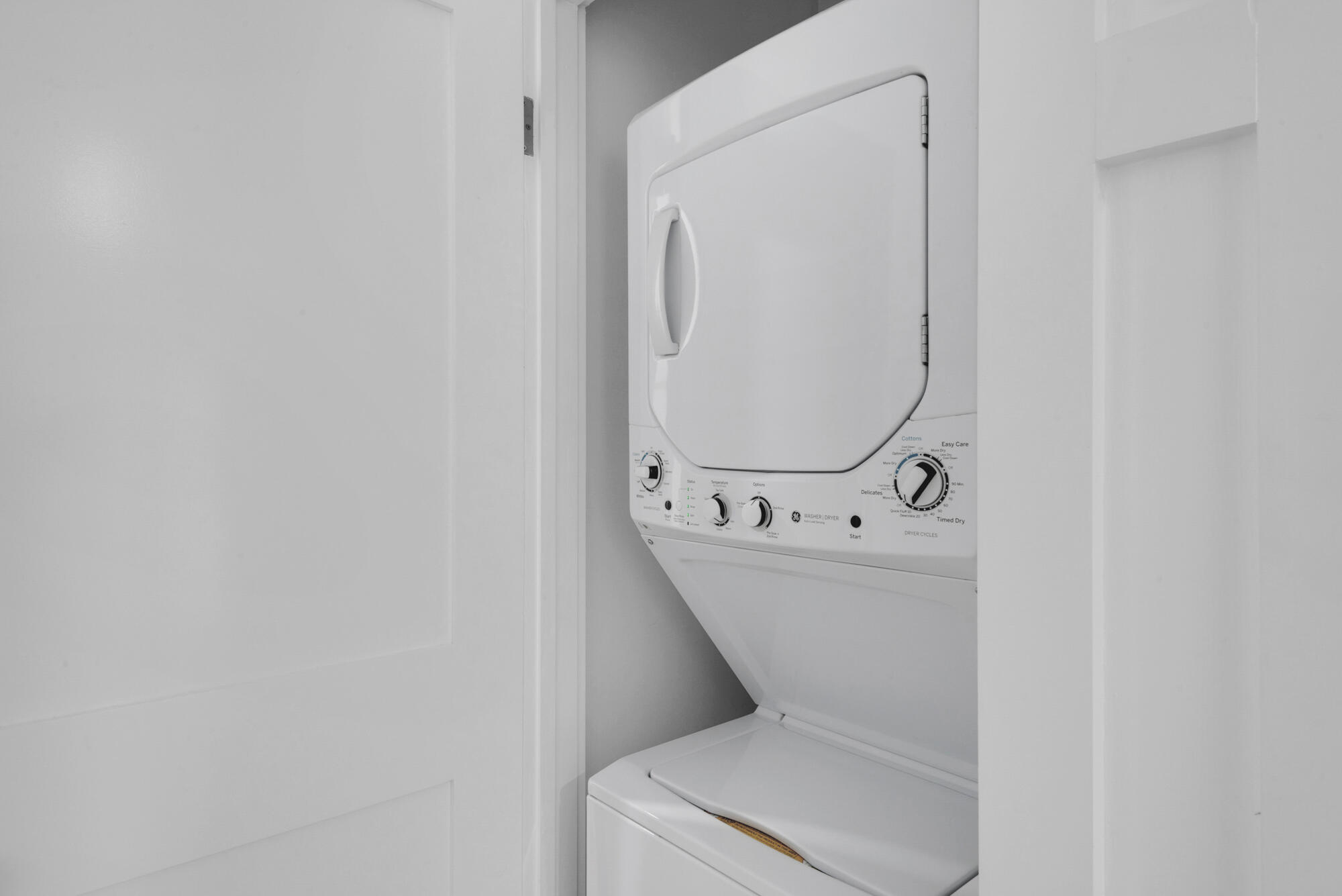 4984 West County Highway 30A, Unit 5B Santa Rosa Beach, FL 32459 - Photo 31 of 46 a utility room with dryer and washer