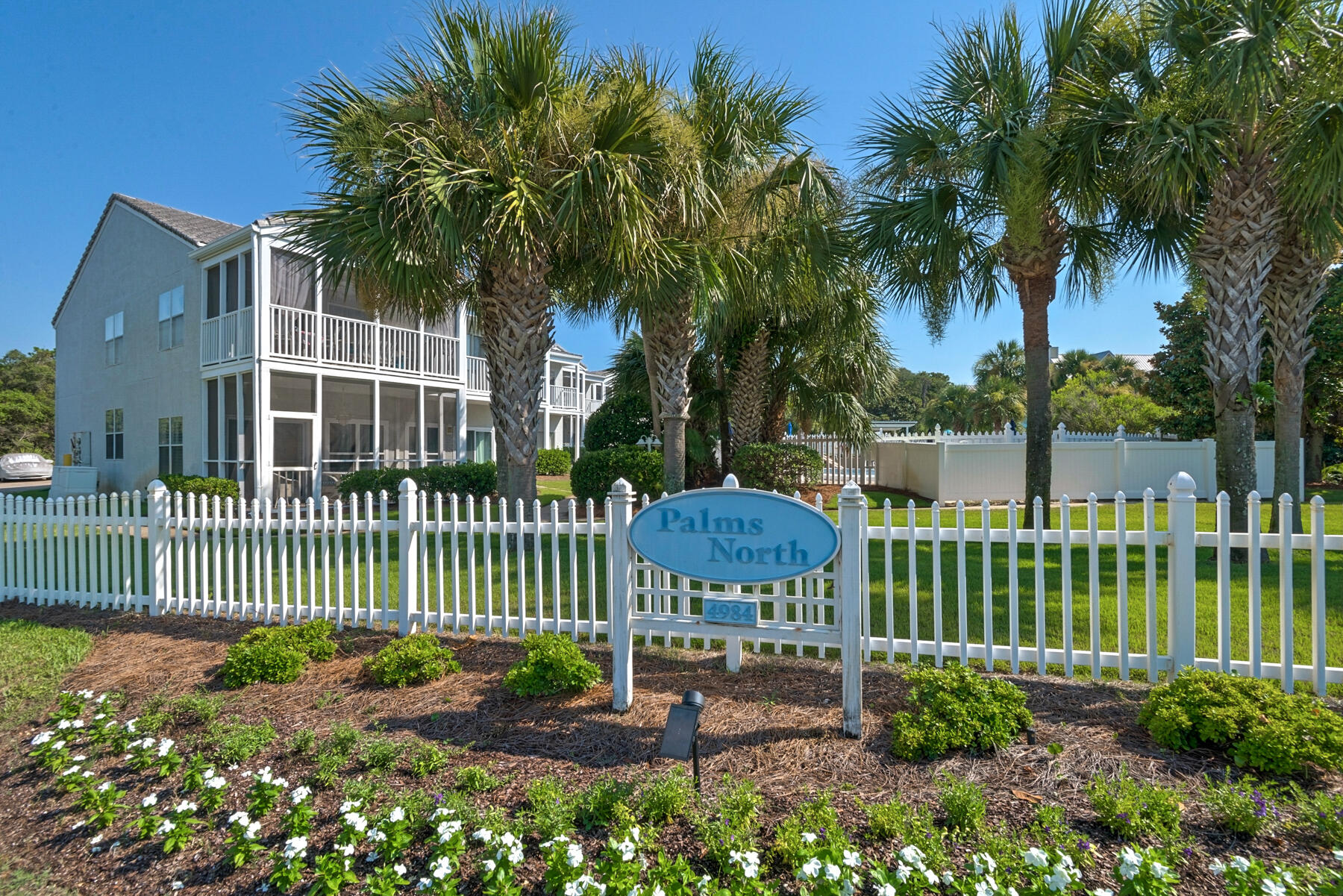 4984 West County Highway 30A, Unit 5B Santa Rosa Beach, FL 32459 - Photo 41 of 46 a view of a house with a yard and plants