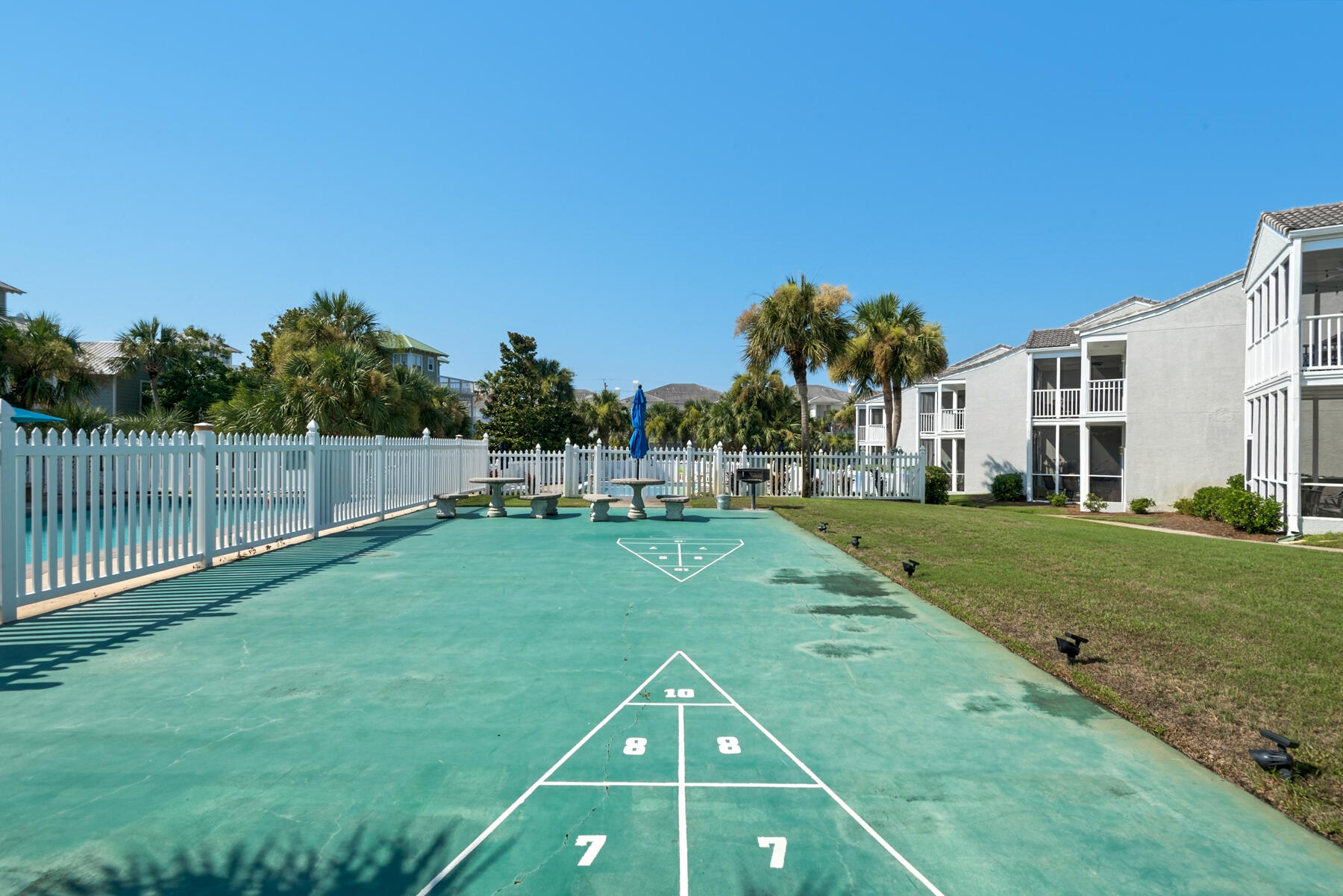 4984 West County Highway 30A, Unit 5B Santa Rosa Beach, FL 32459 - Photo 44 of 46 a view of a house with a backyard