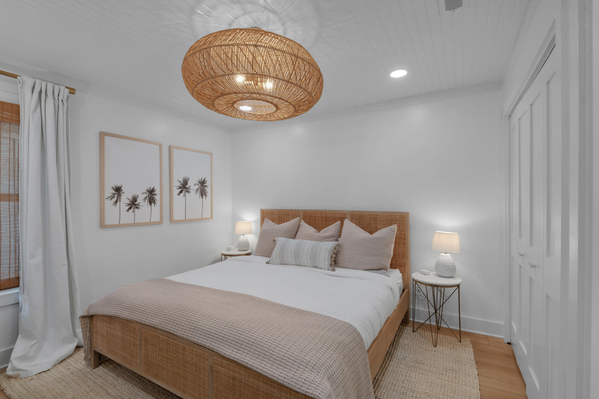 4984 West County Highway 30A, Unit 5B Santa Rosa Beach, FL 32459 - Photo 10 of 46 a bedroom with a bed and a painting on the wall