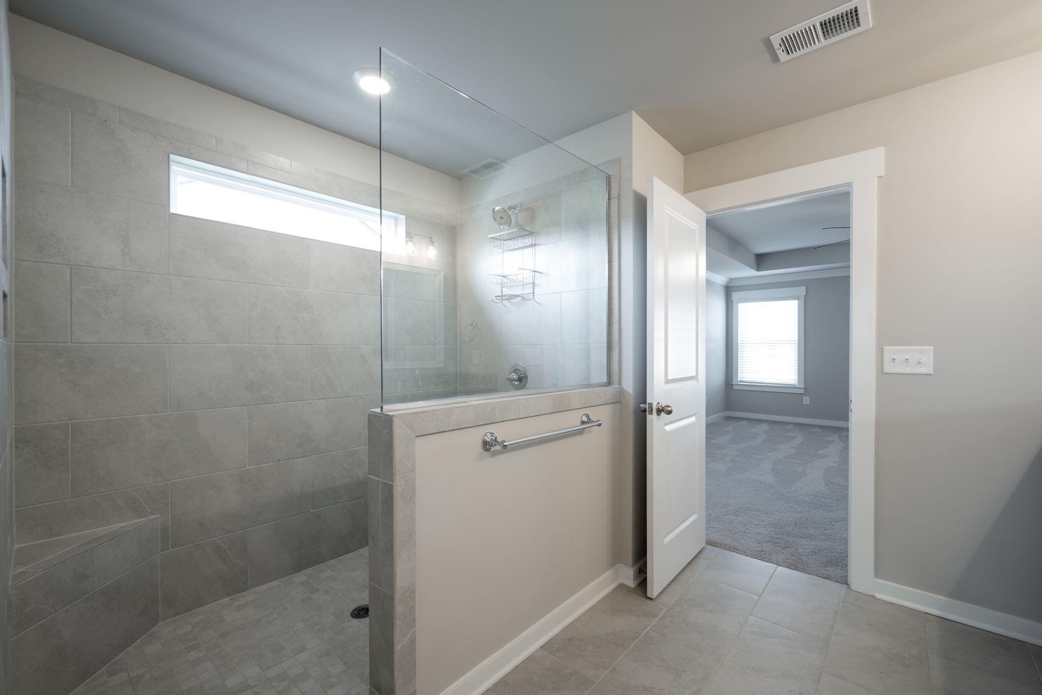 7401 McDaniel Lane Ooltewah, TN 37363 - Photo 21 of 44 a bathroom with a shower
