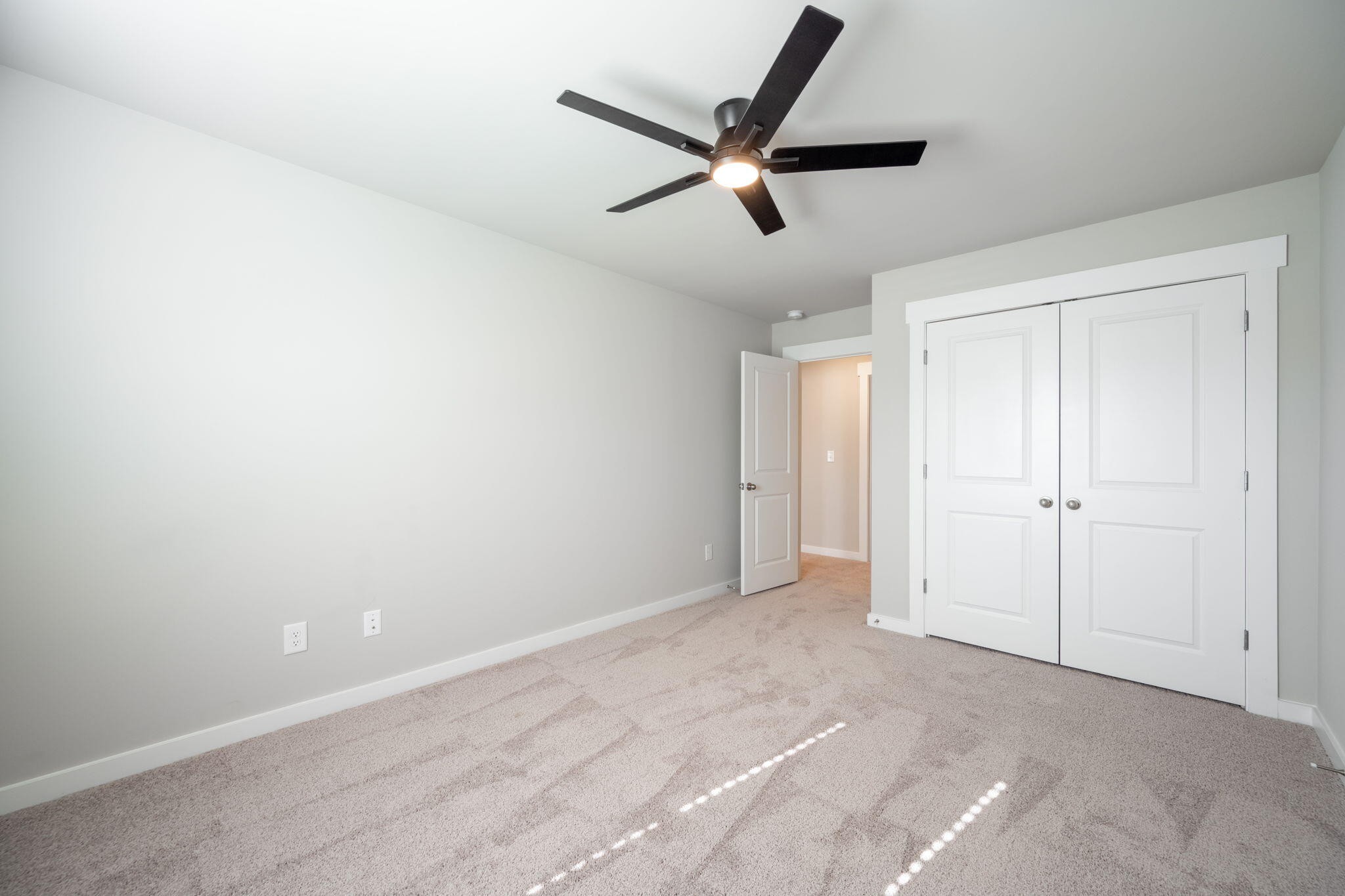 7401 McDaniel Lane Ooltewah, TN 37363 - Photo 29 of 44 a view of a big room with closet and ceiling fan