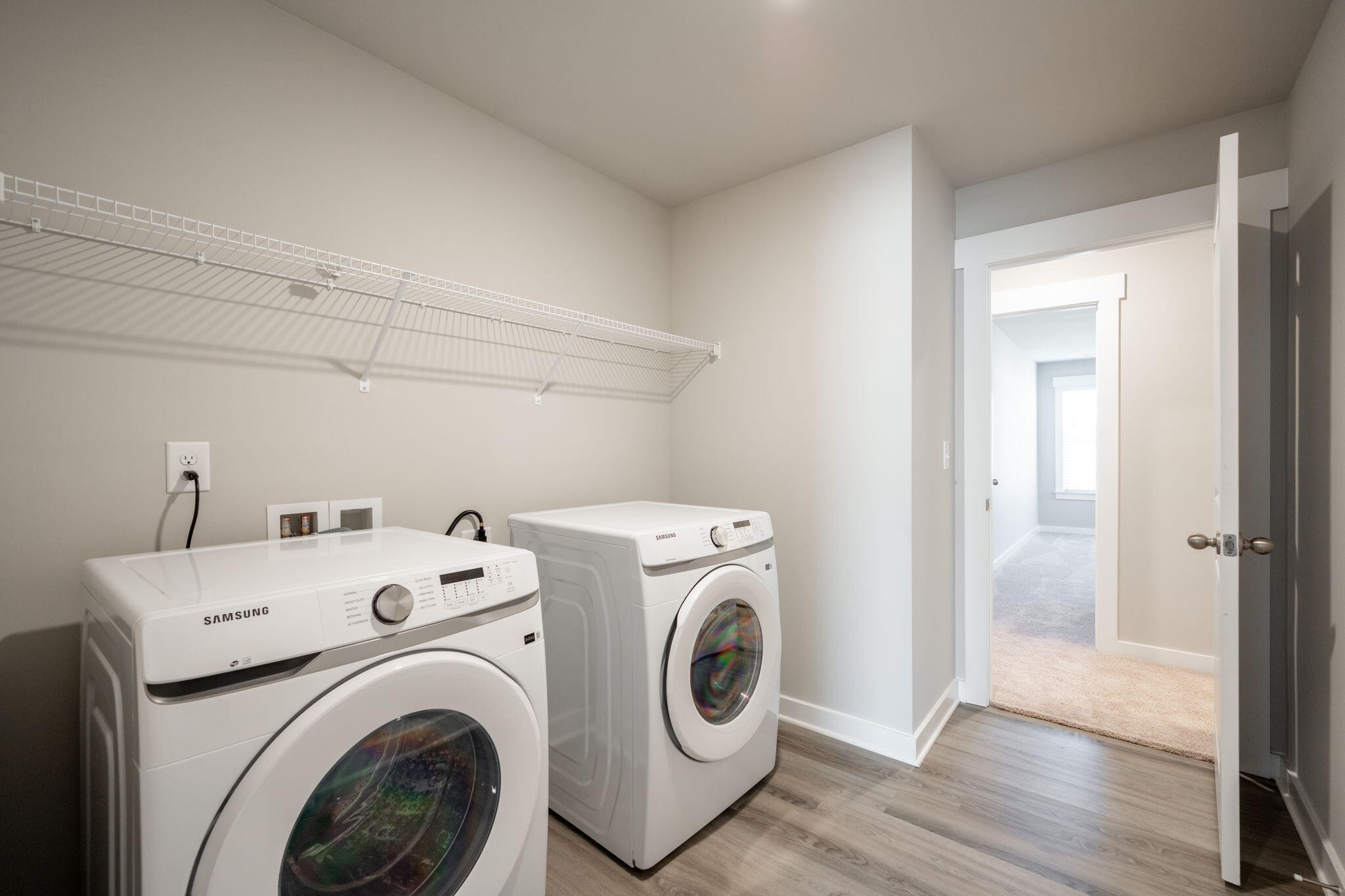 7401 McDaniel Lane Ooltewah, TN 37363 - Photo 31 of 44 a utility room with dryer and washer