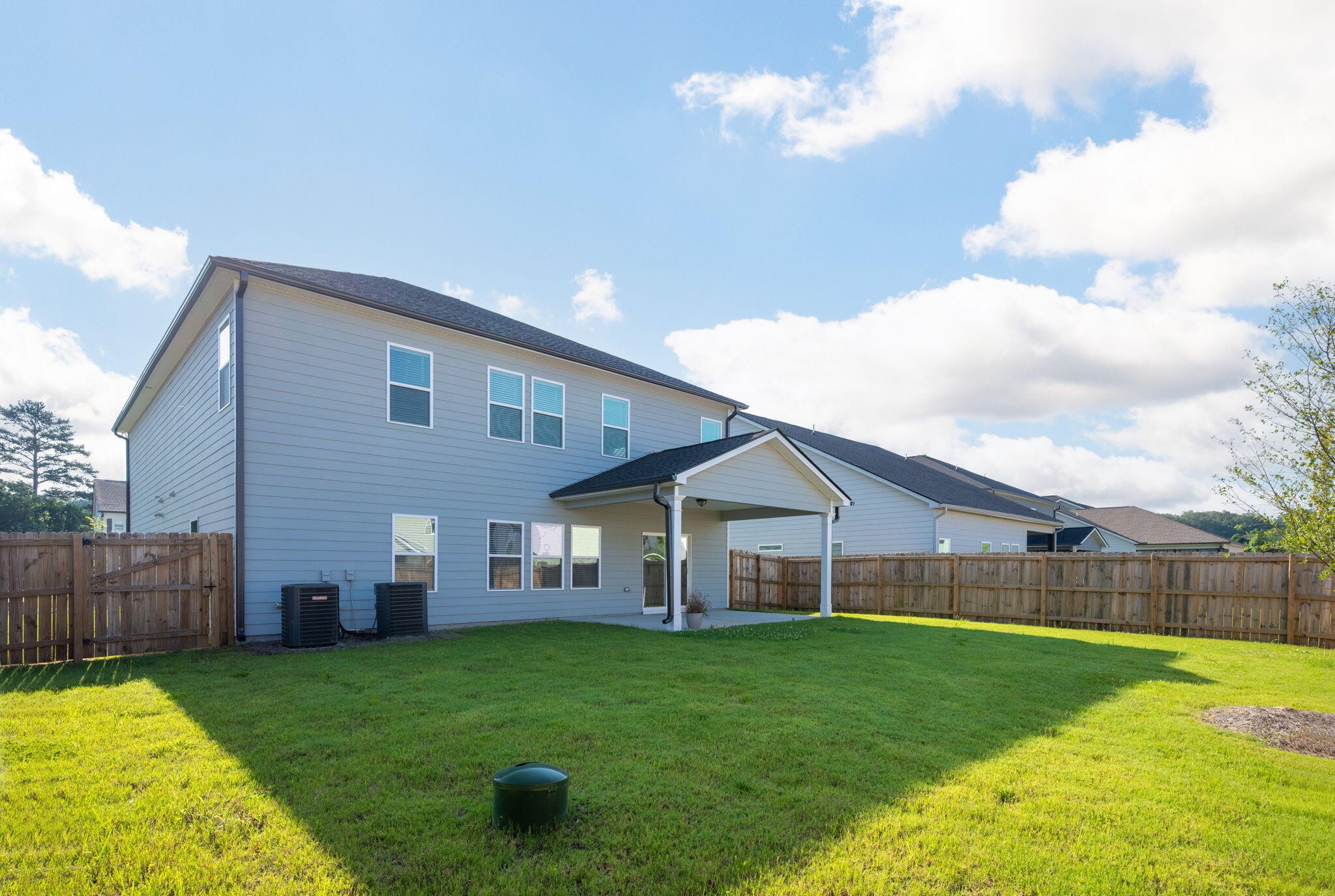 7401 McDaniel Lane Ooltewah, TN 37363 - Photo 43 of 44 a view of a house with backyard