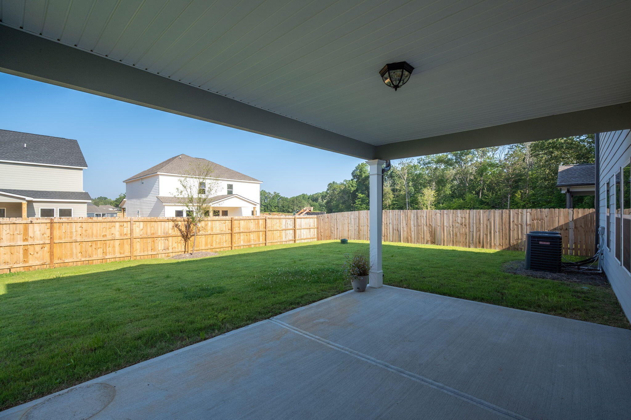 7401 McDaniel Lane Ooltewah, TN 37363 - Photo 44 of 44 a view of a house with backyard and porch