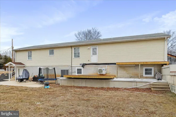 a front view of a house with a ocean view