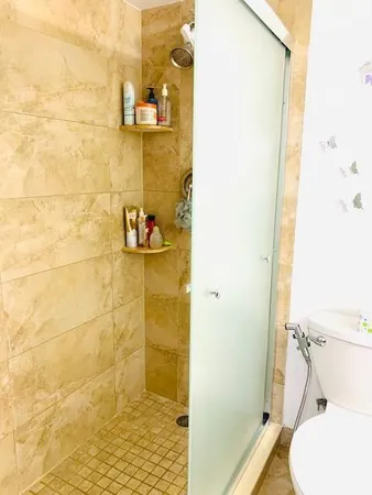 a bathroom with a sink and a shower