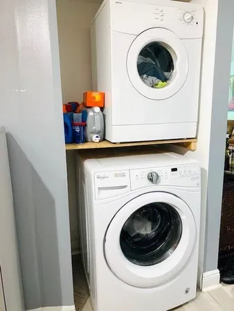 a utility room with dryer and washer