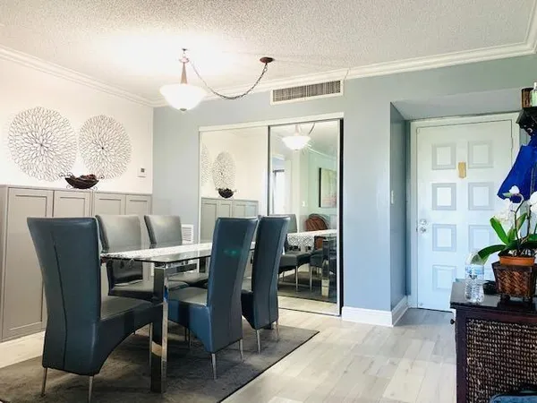 a view of a dining room with furniture