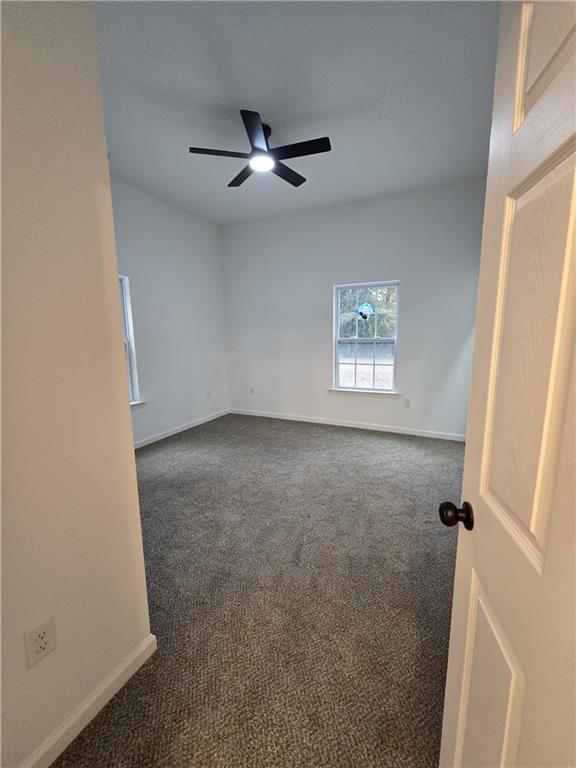 4645 Gordon Street Fairburn, GA 30213 - Photo 12 of 17 a view of a livingroom with a window