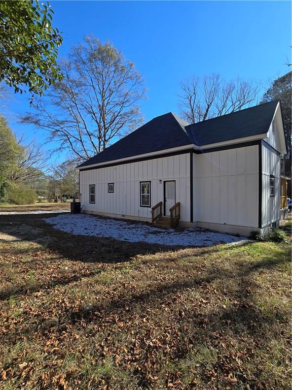4645 Gordon Street Fairburn, GA 30213 - Photo 3 of 17 a view of a house with a yard