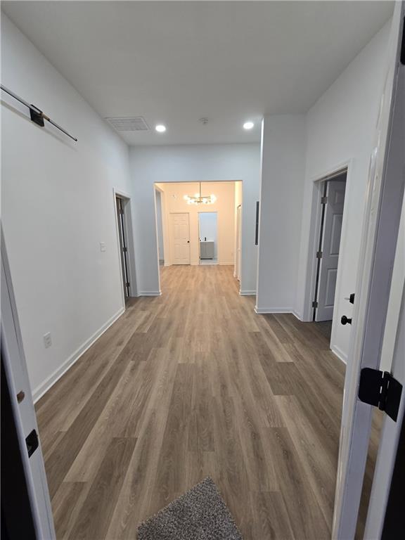 4645 Gordon Street Fairburn, GA 30213 - Photo 5 of 17 a view of empty room with wooden floor