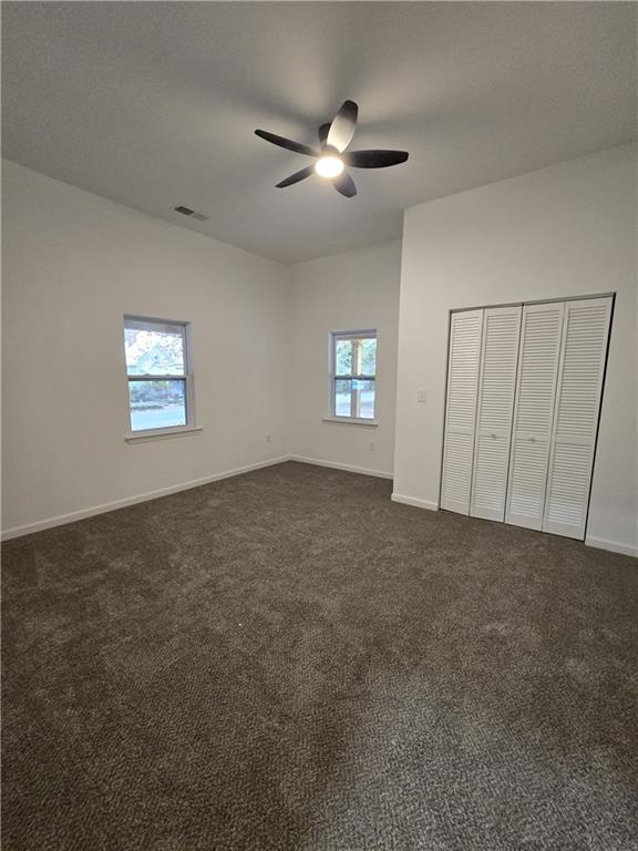 4645 Gordon Street Fairburn, GA 30213 - Photo 7 of 17 a view of an empty room with a window