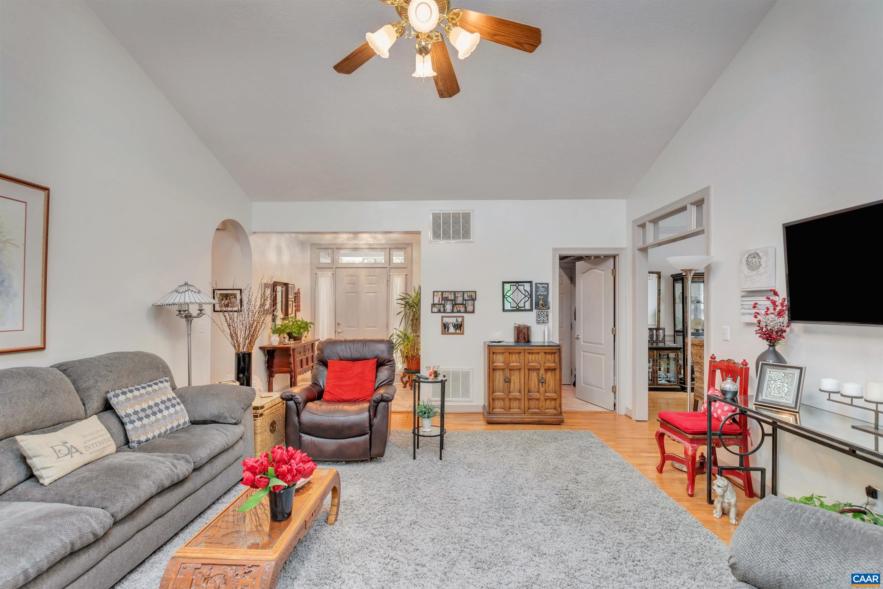 5 Xebec Road Palmyra, VA 22963 - Photo 4 of 30 a living room with furniture a flat screen tv and a window