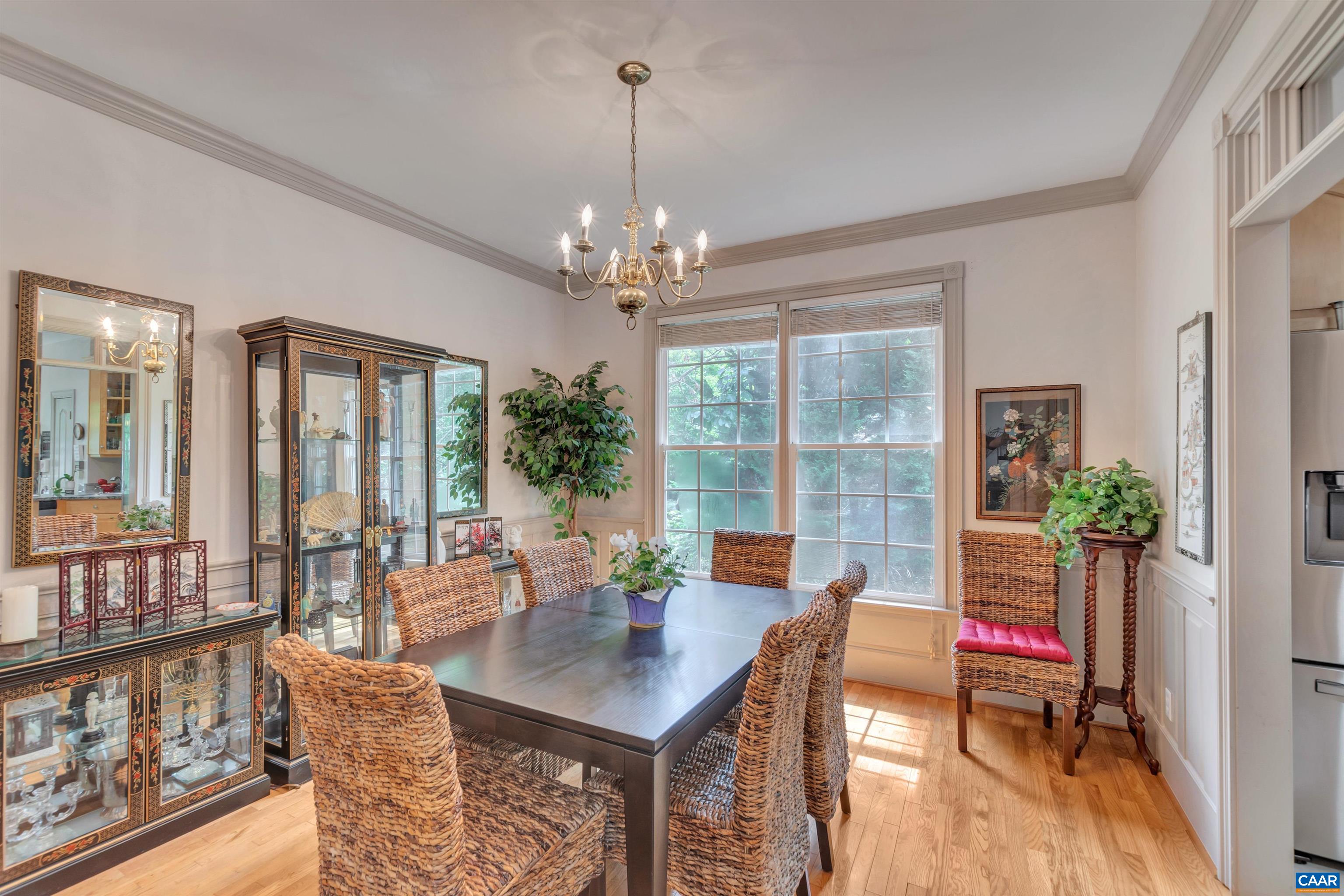 5 Xebec Road Palmyra, VA 22963 - Photo 8 of 30 a living room with furniture a chandelier and a floor to ceiling window