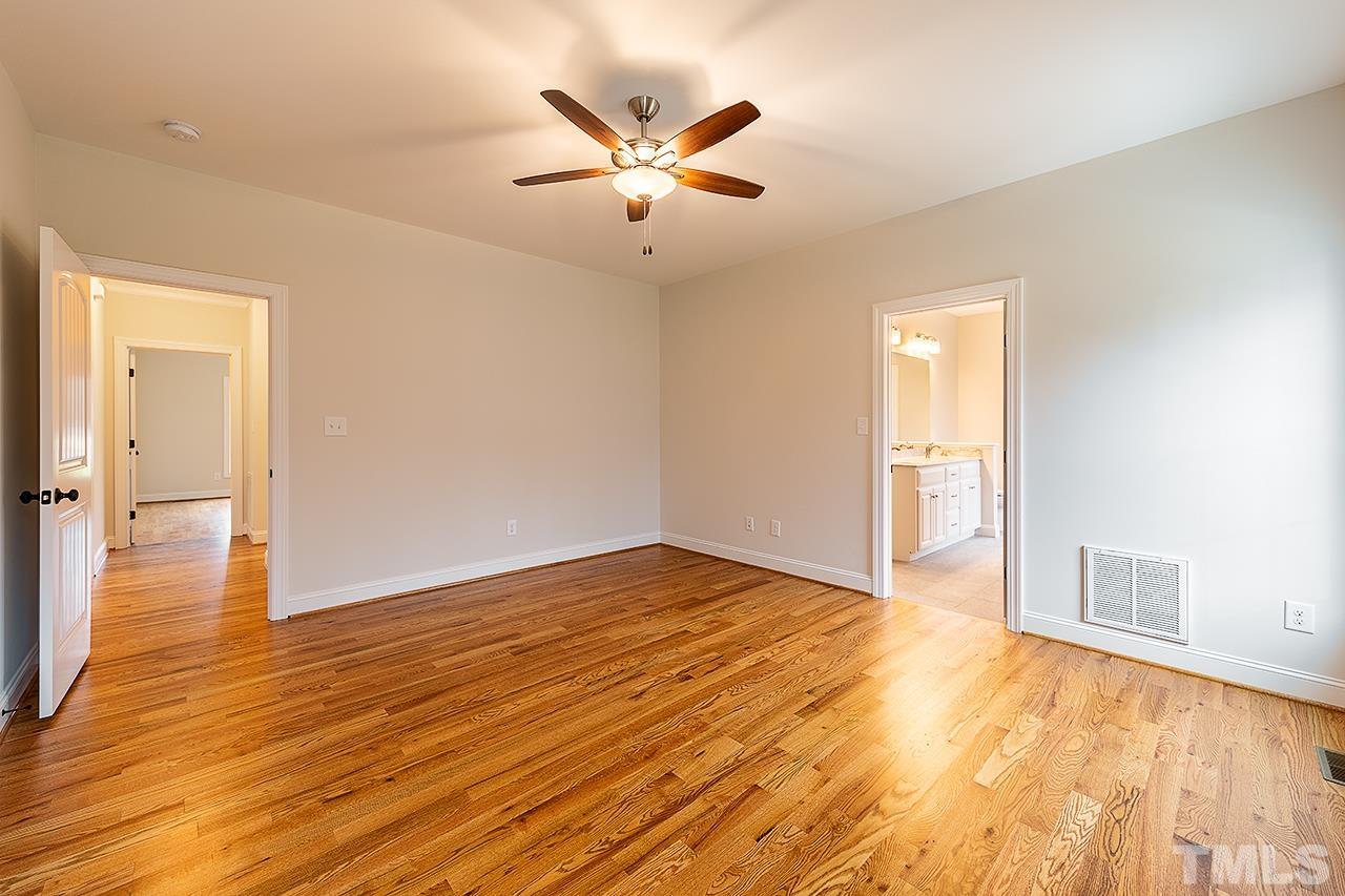 L9 Harvest Rdg Road Battleboro, NC 27809 - Photo 11 of 18 a view of an empty room and wooden floor