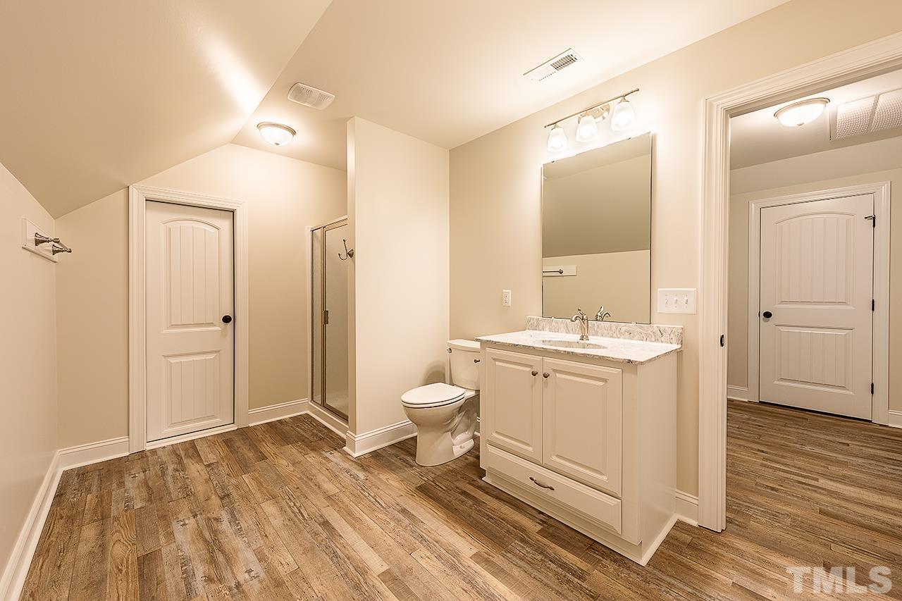 L9 Harvest Rdg Road Battleboro, NC 27809 - Photo 8 of 18 a bathroom with a sink a toilet and shower