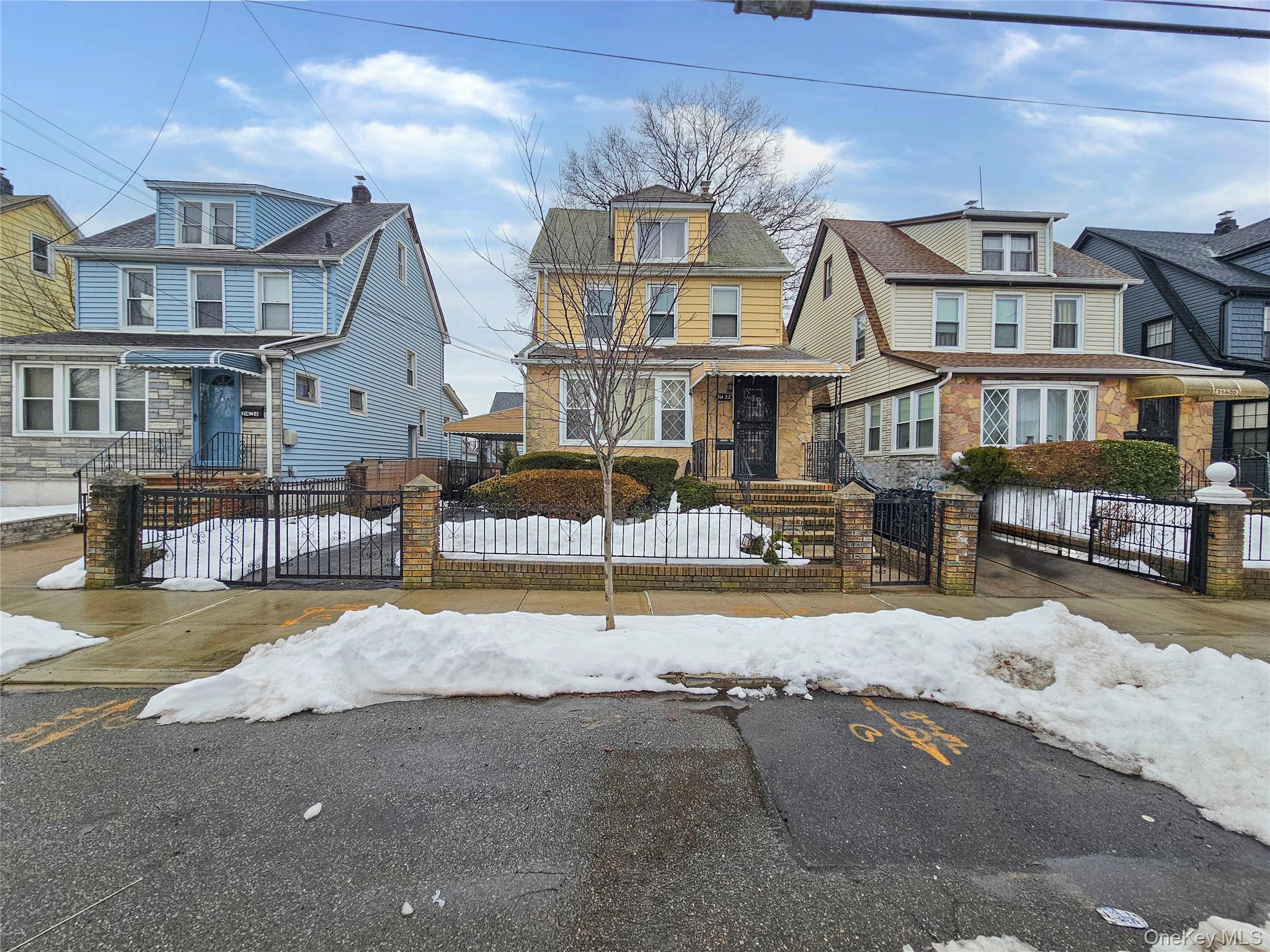 front view of a house with a patio