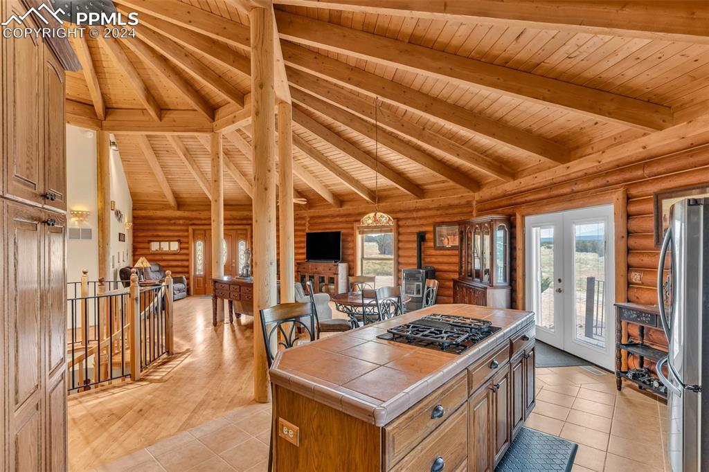 1747 Newton Road Pueblo, CO 81005 - Photo 17 of 50 a kitchen that has a stove and a table