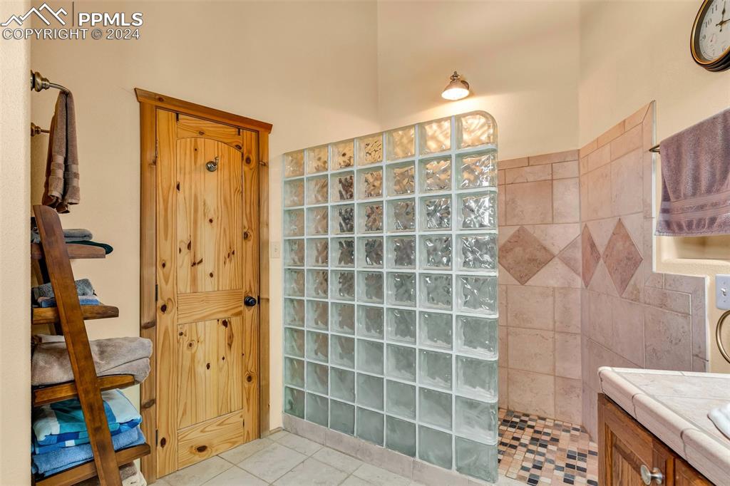 1747 Newton Road Pueblo, CO 81005 - Photo 20 of 50 a bathroom with a shower