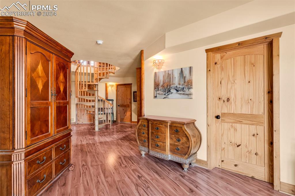 1747 Newton Road Pueblo, CO 81005 - Photo 32 of 50 a view of a entryway with wooden floor