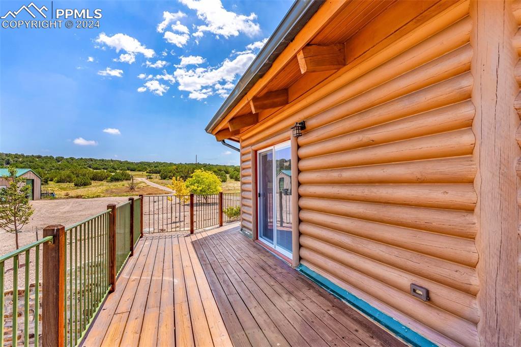1747 Newton Road Pueblo, CO 81005 - Photo 37 of 50 a view of a balcony with wooden floor