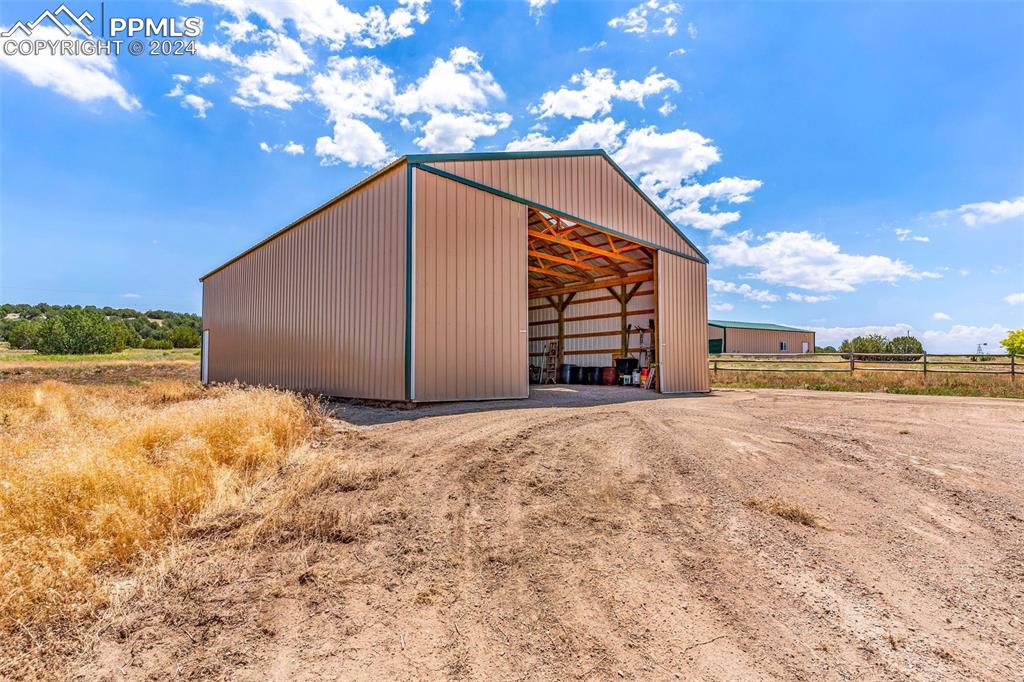 1747 Newton Road Pueblo, CO 81005 - Photo 41 of 50 a view of a house with a yard