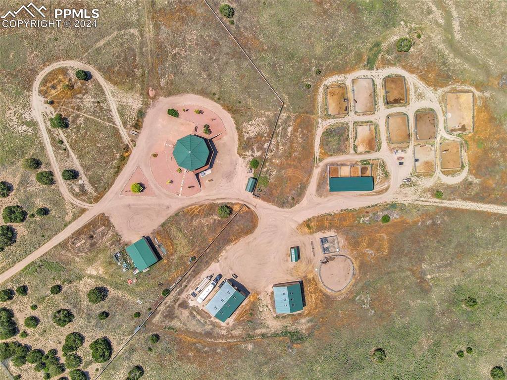 1747 Newton Road Pueblo, CO 81005 - Photo 50 of 50 a bathroom with a sink mirror and shower