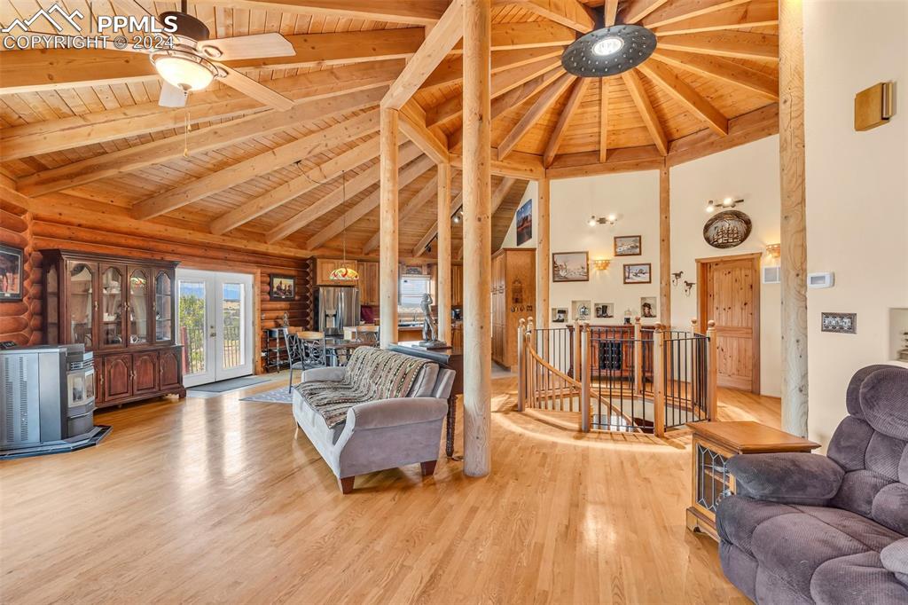 1747 Newton Road Pueblo, CO 81005 - Photo 8 of 50 a dining room with wooden floor and furniture