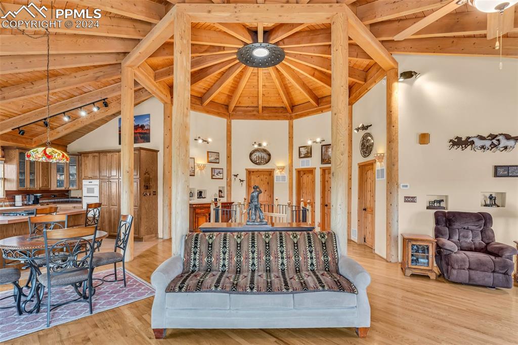 1747 Newton Road Pueblo, CO 81005 - Photo 10 of 50 a living room with furniture and wooden floor