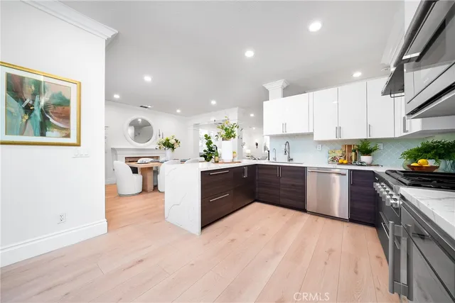 a bedroom with a bed and a potted plant