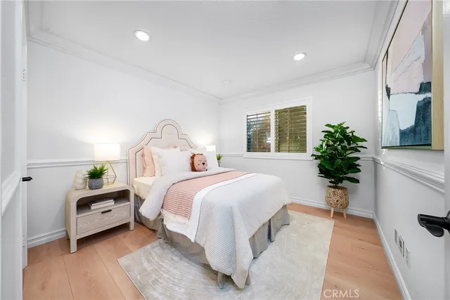 a bathroom with a double vanity sink toilet and shower