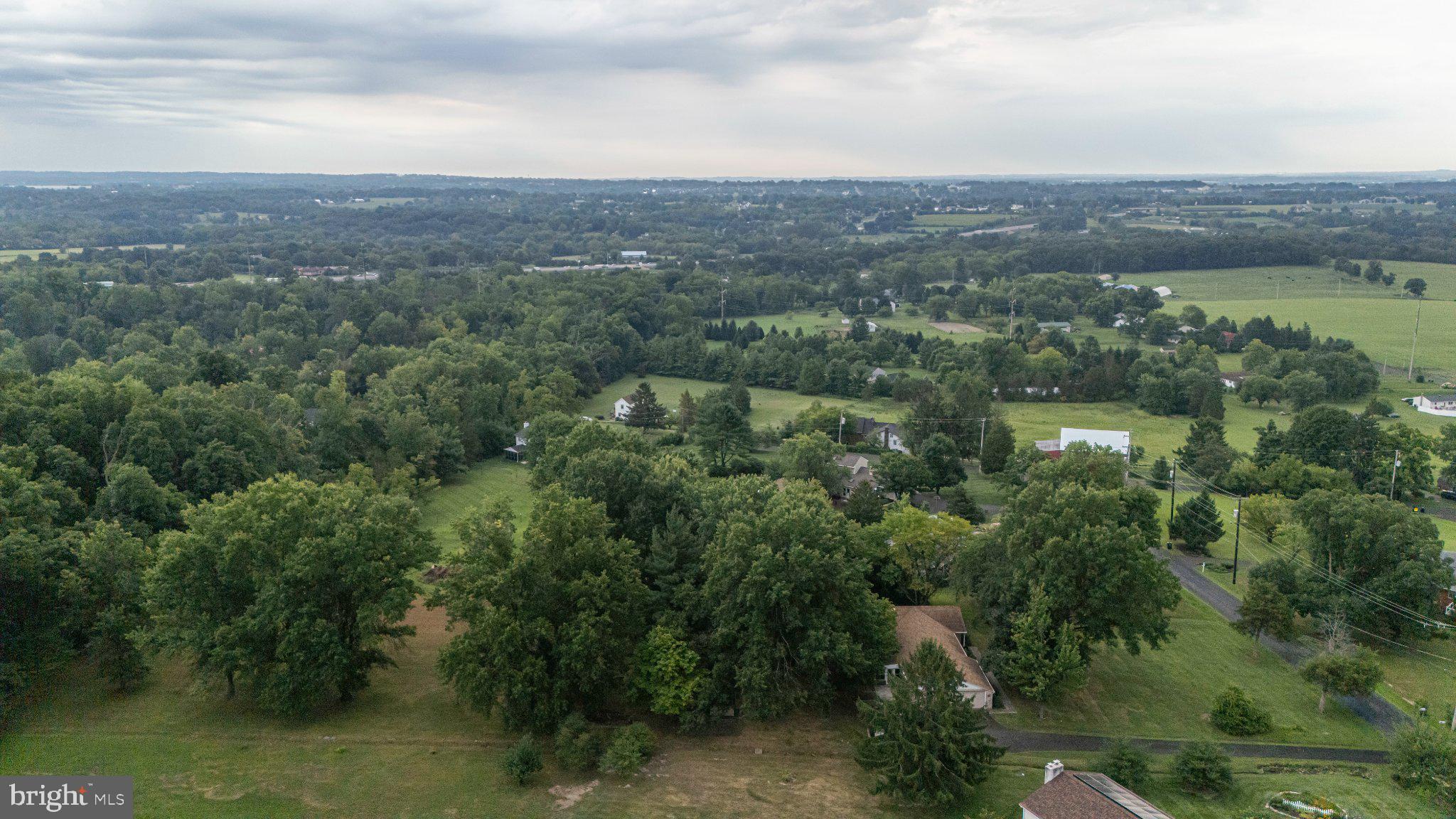 130 Webber Road Telford, PA 18969 - Photo 47 of 52 Lush green landscape under cloudy skies.