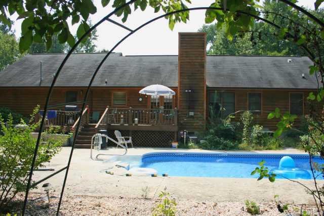 4 Orion Circle Rougemont, NC 27572 - Photo 8 of 8 a view of a backyard