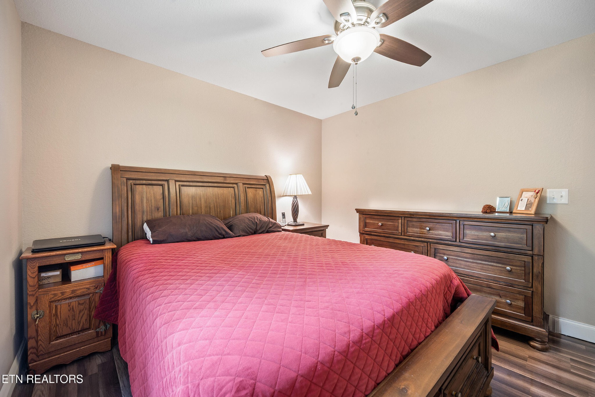 534 Shellbark Road Newport, TN 37821 - Photo 14 of 29 a bedroom with a bed and a chandelier
