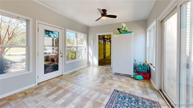 a view of entryway with window and hallway