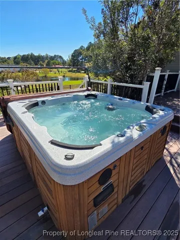 a view of swimming pool with outdoor seating