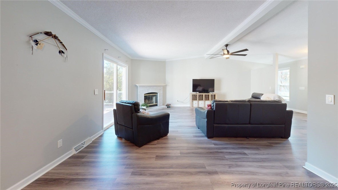 120 Mockingbird Lane Spring Lake, NC 28390 - Photo 7 of 23 a living room with furniture and a flat screen tv