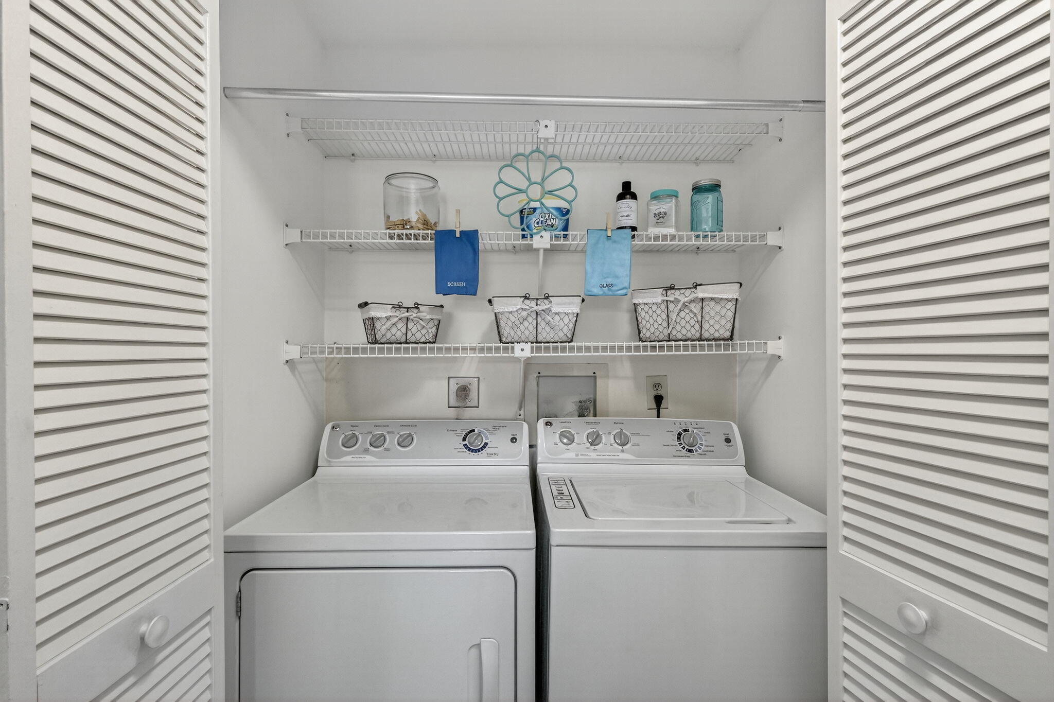 7643 Southeast Sugar Sand Circle Hobe Sound, FL 33455 - Photo 19 of 44 a utility room with dryer and washer