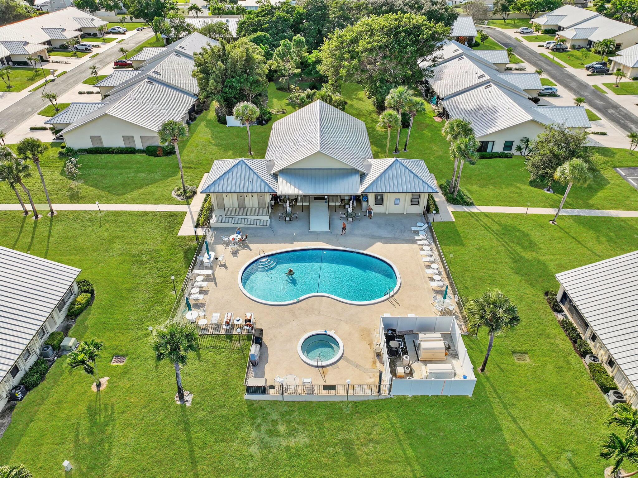 7643 Southeast Sugar Sand Circle Hobe Sound, FL 33455 - Photo 2 of 44 an aerial view of a house with swimming pool garden and outdoor seating